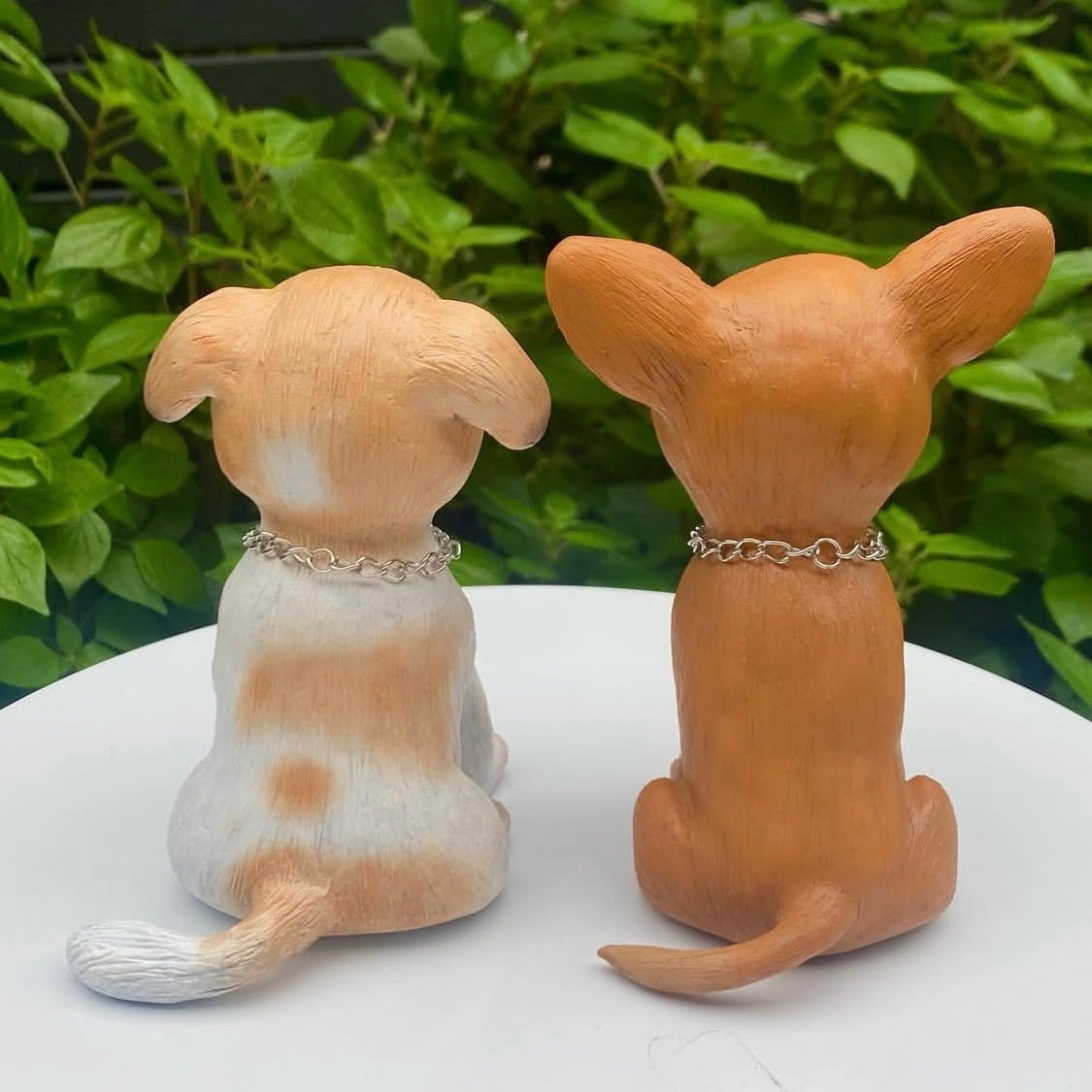 Two commissioned polymer clay sculptures of dogs, one Russian toy terrier the other a jack Russell.